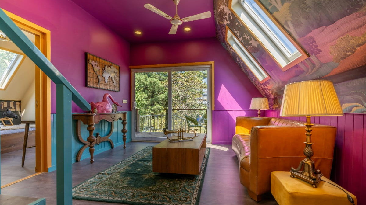 An airy room decorated in pink colors