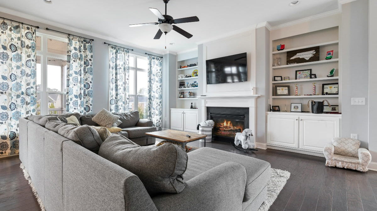 A huge gray sofa in a living room