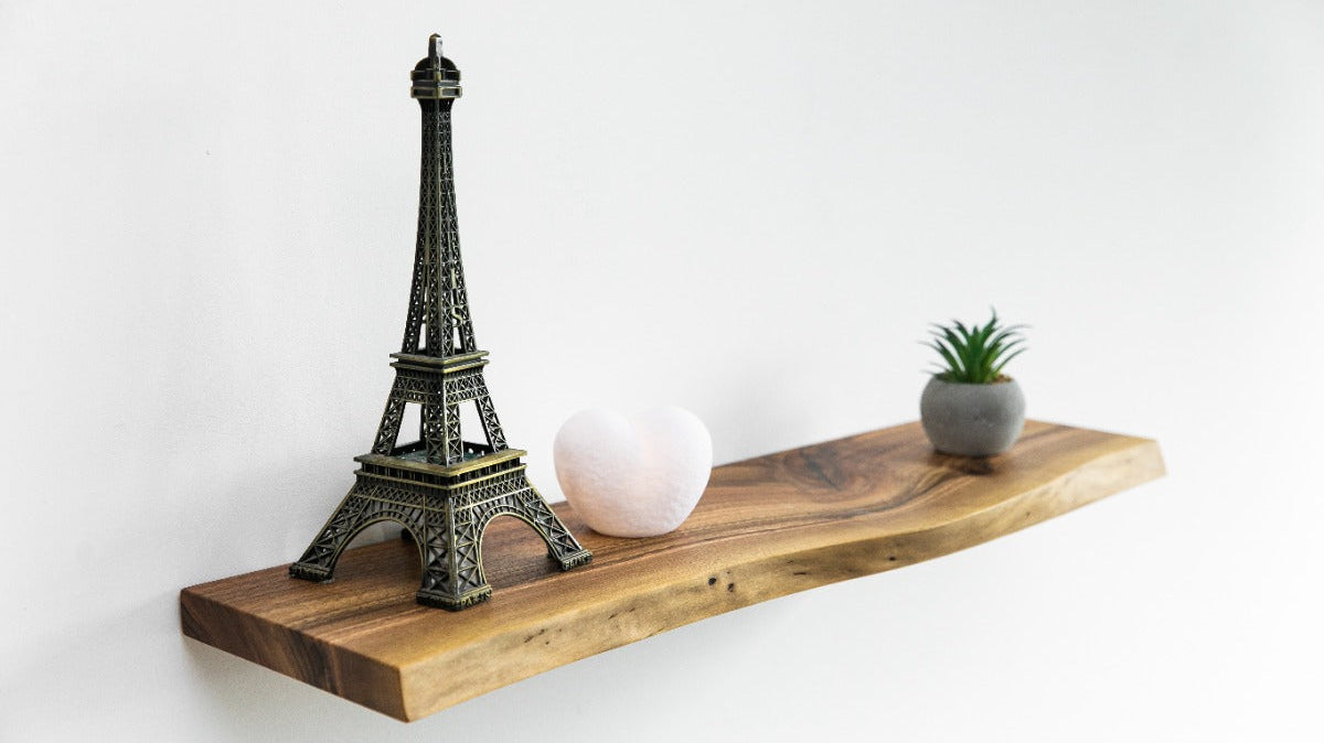 Modern floating shelf with Eiffel Tower