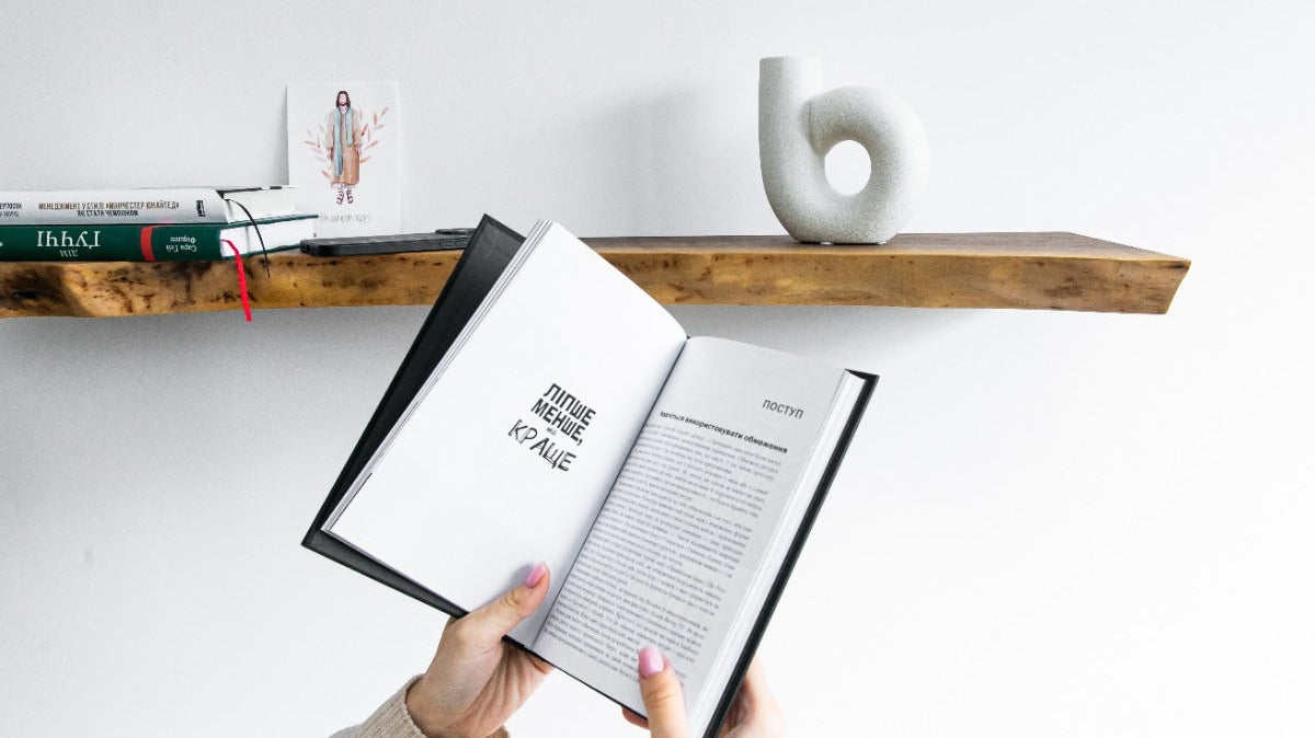Floating shelf with books and decor