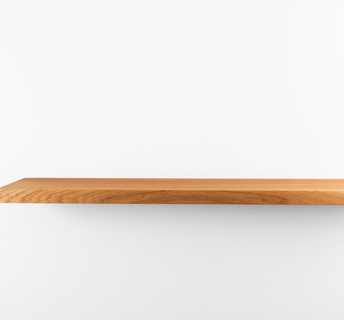 Wooden shelf on a white background