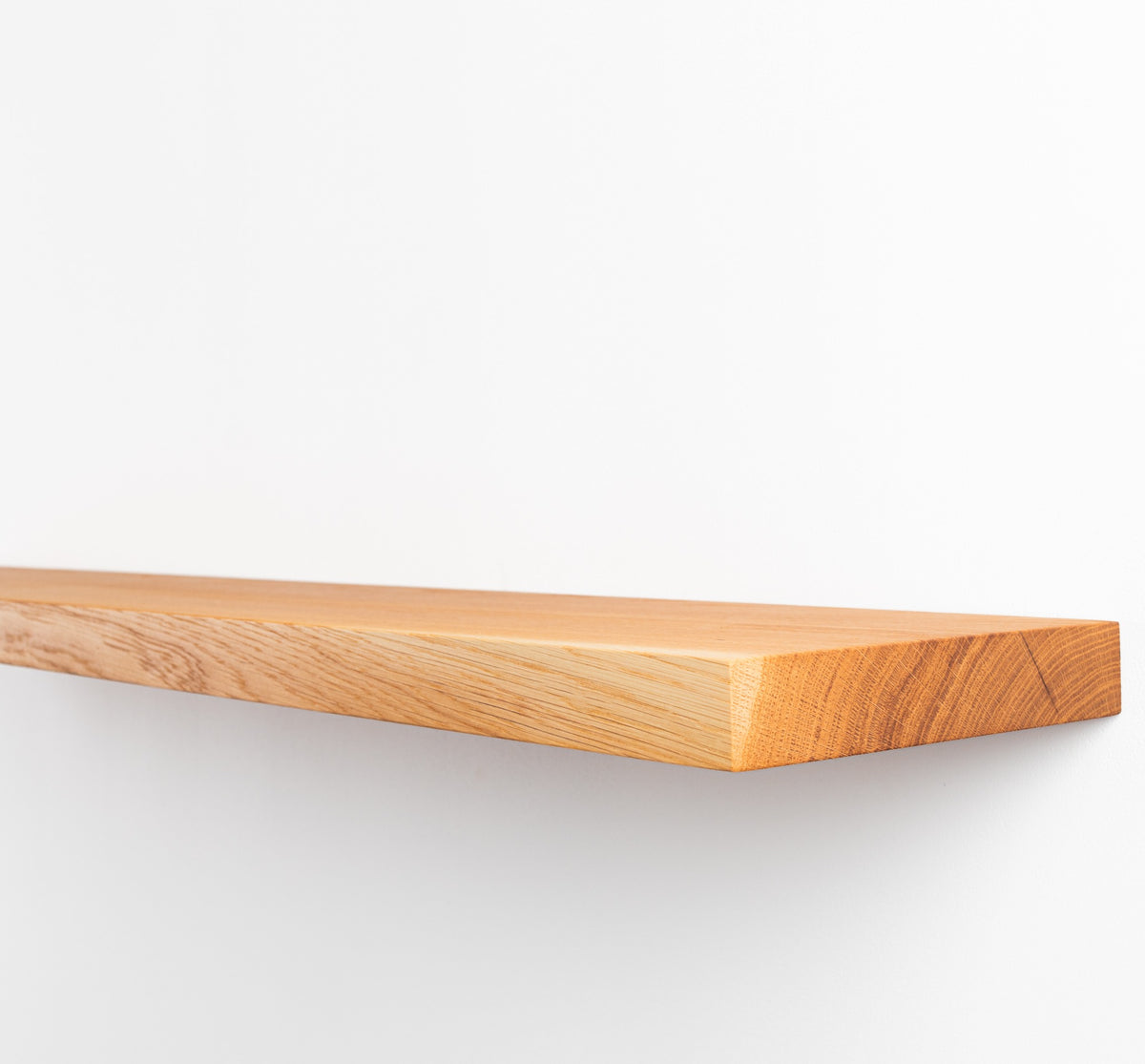 Wooden shelf on a white background