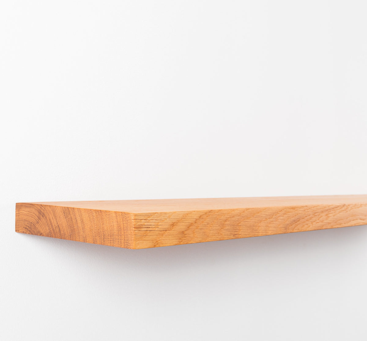 Wooden shelf on a white background