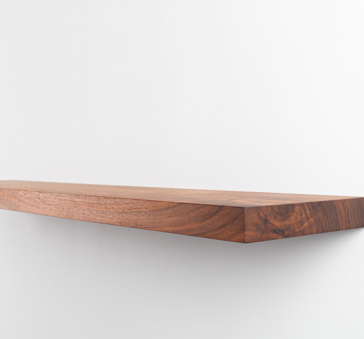Wooden shelf on a white background