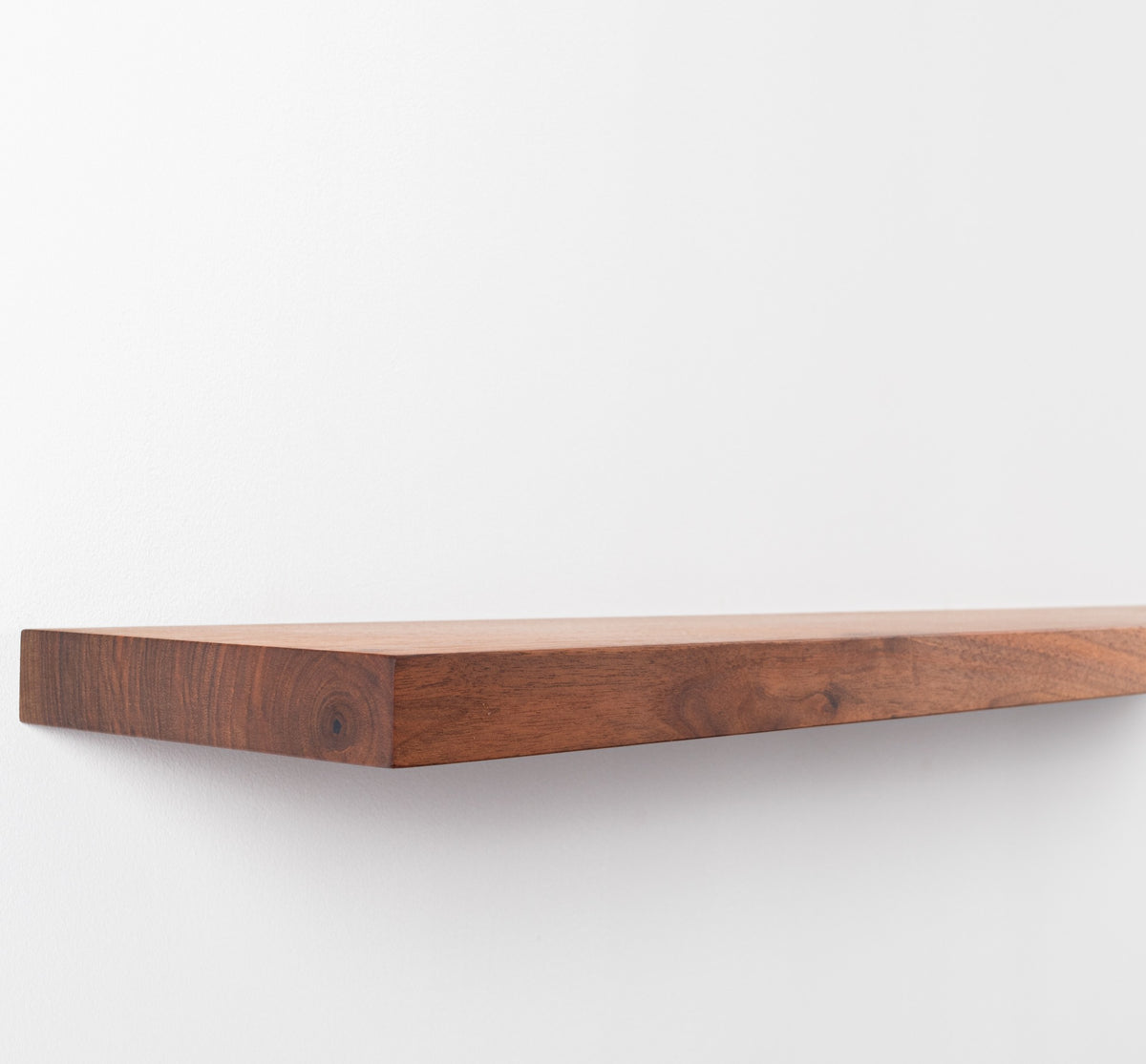 Wooden shelf on a white background