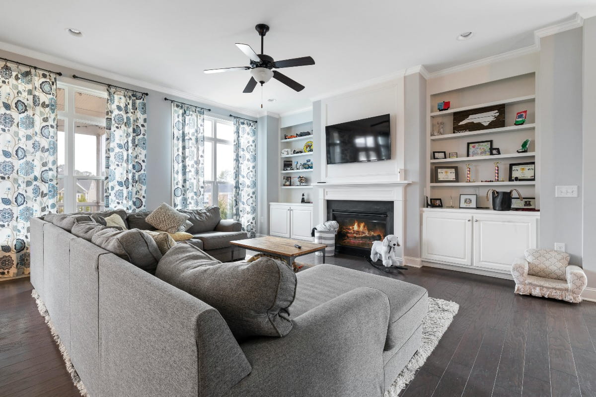 A huge gray sofa in a living room