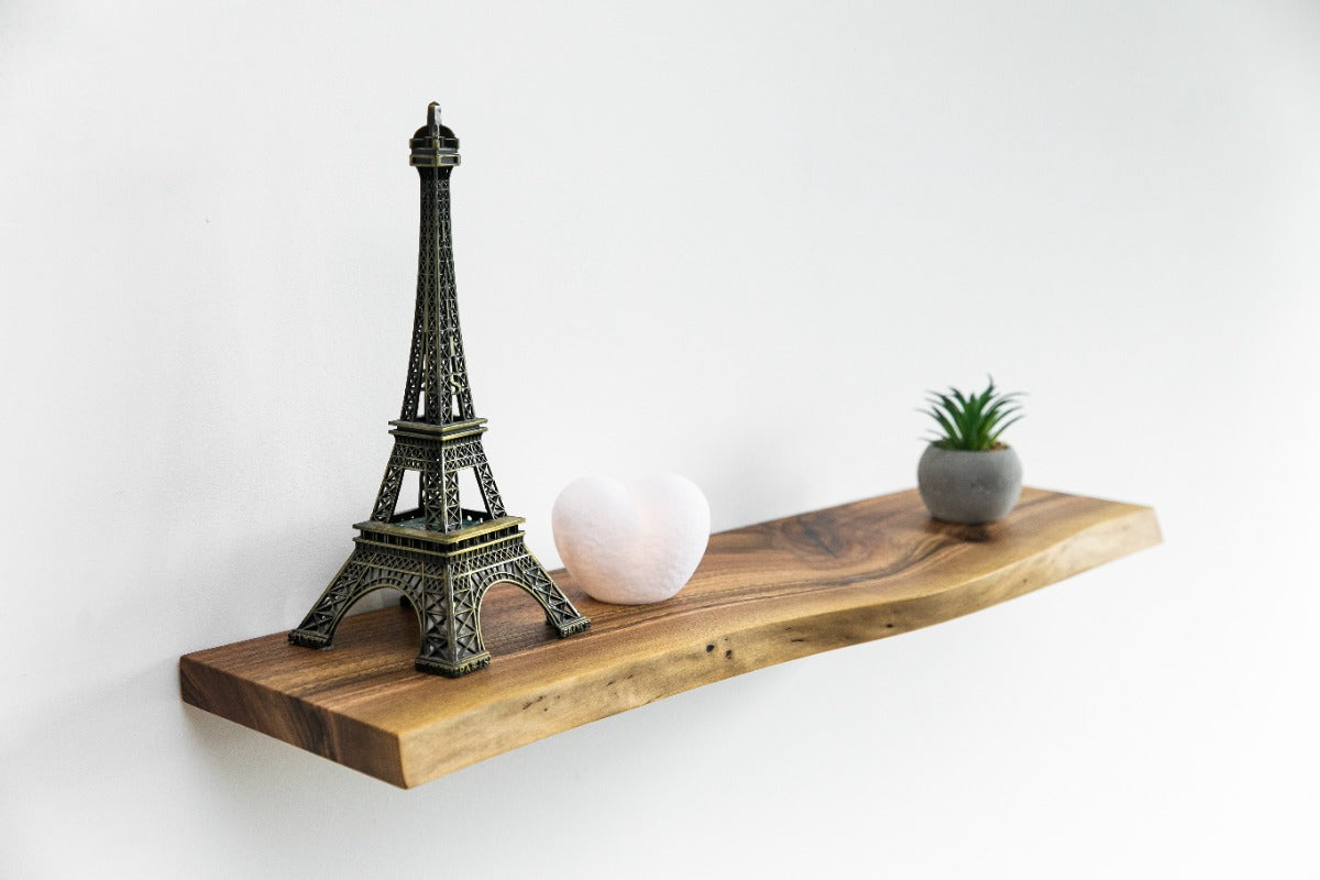 Modern floating shelf with Eiffel Tower