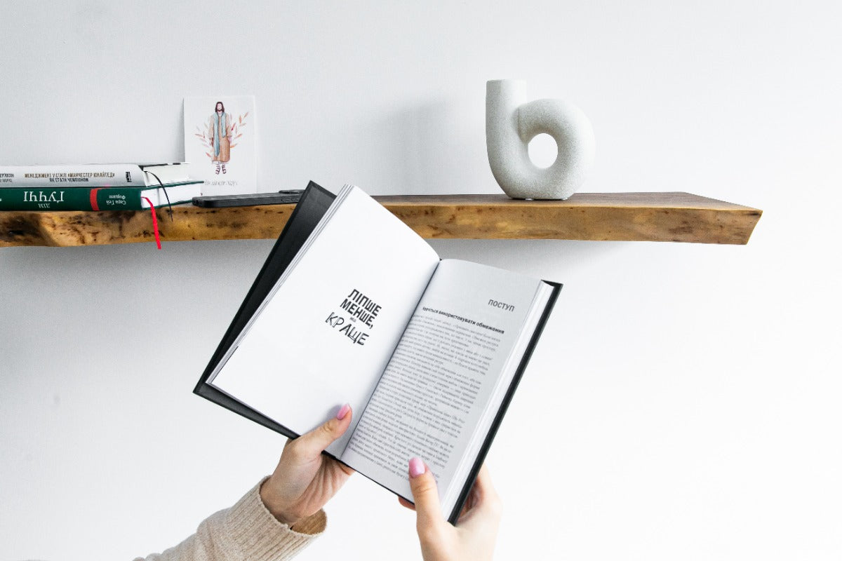 Floating shelf with books and decor