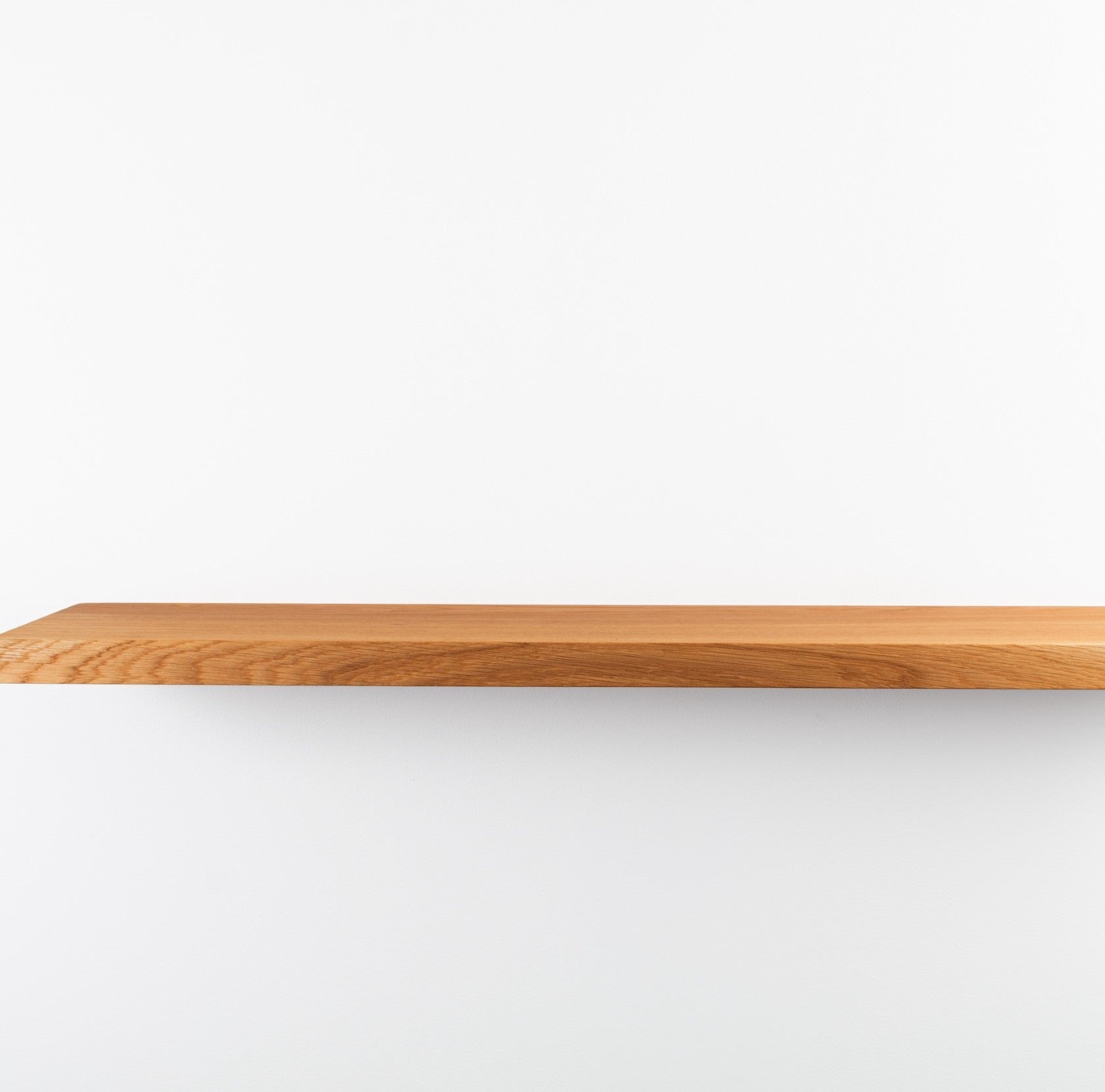 Wooden shelf on a white background