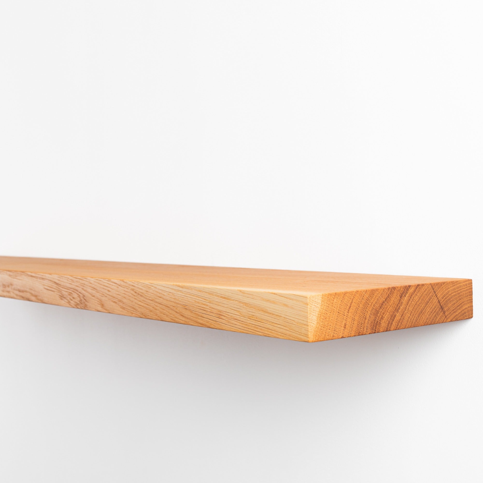 Wooden shelf on a white background