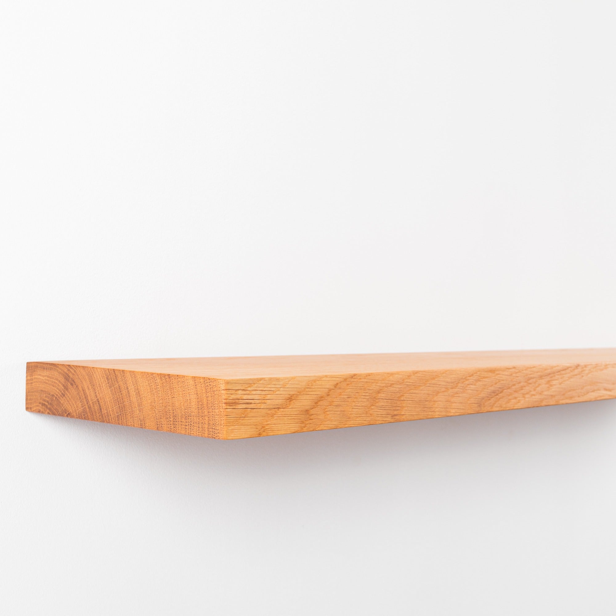 Wooden shelf on a white background