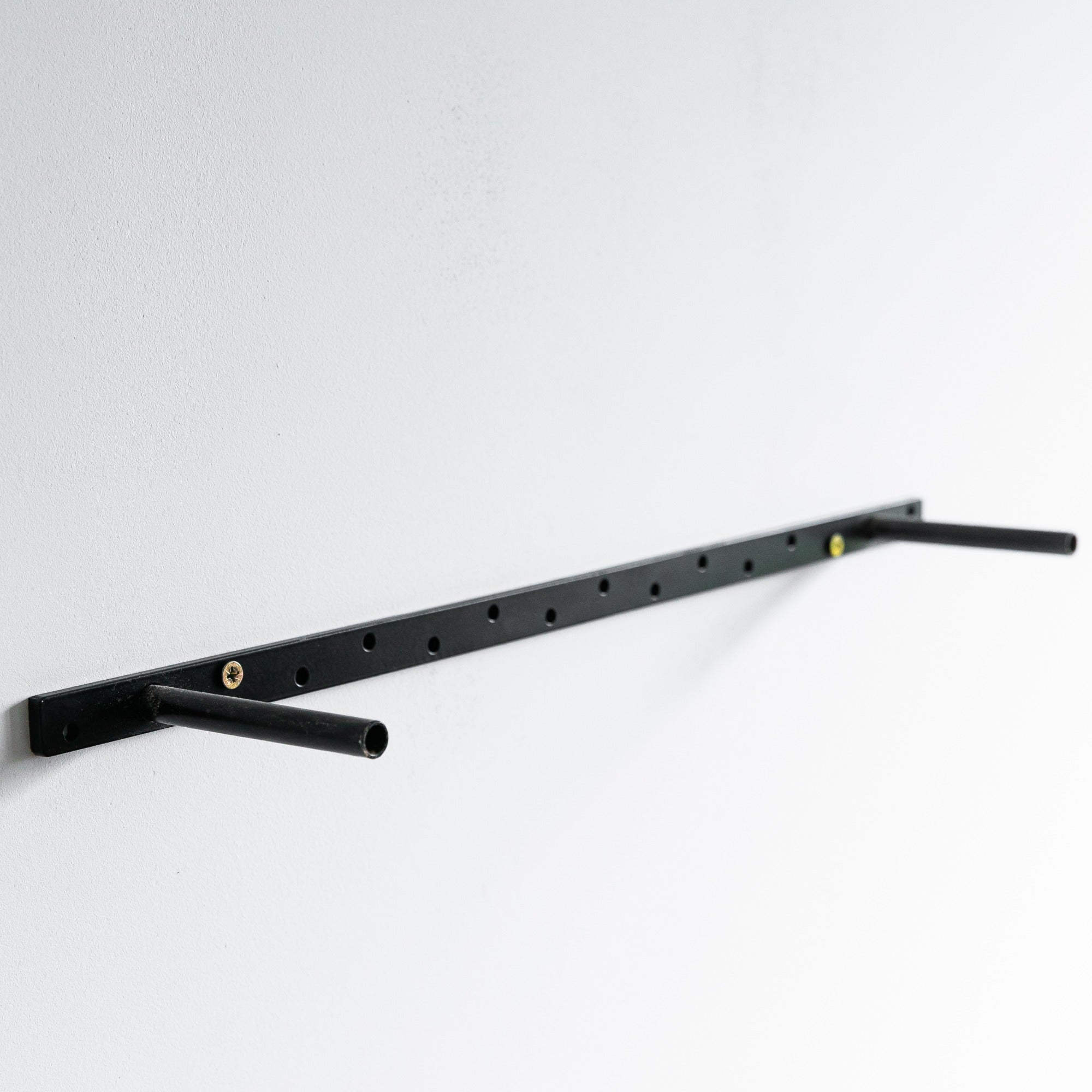 Black metal shelf bracket on a white background