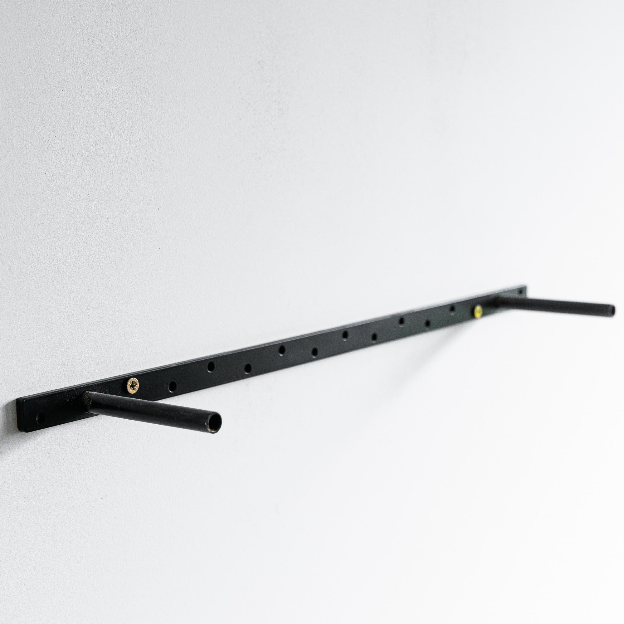 Black metal shelf bracket on a white background