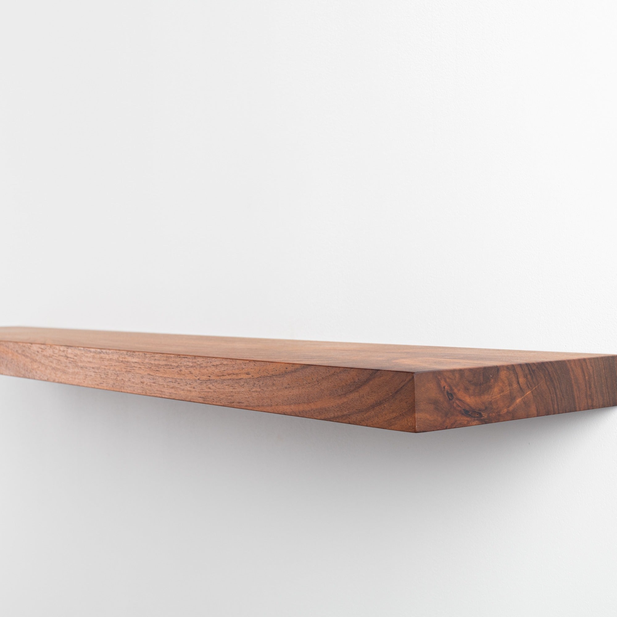 Wooden shelf on a white background