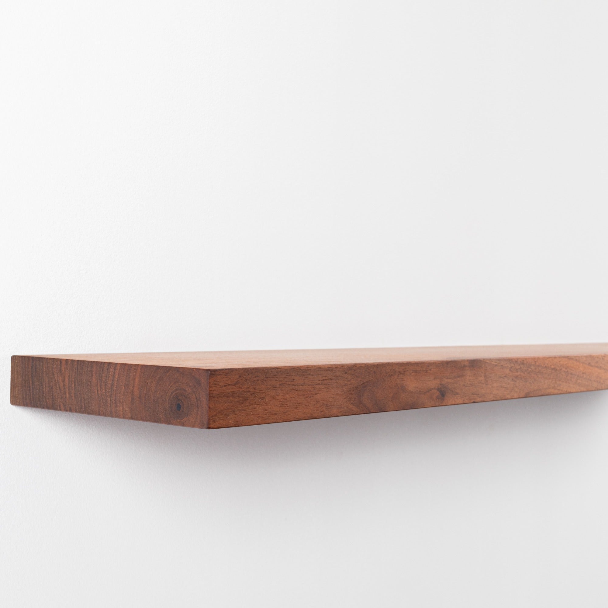 Wooden shelf on a white background